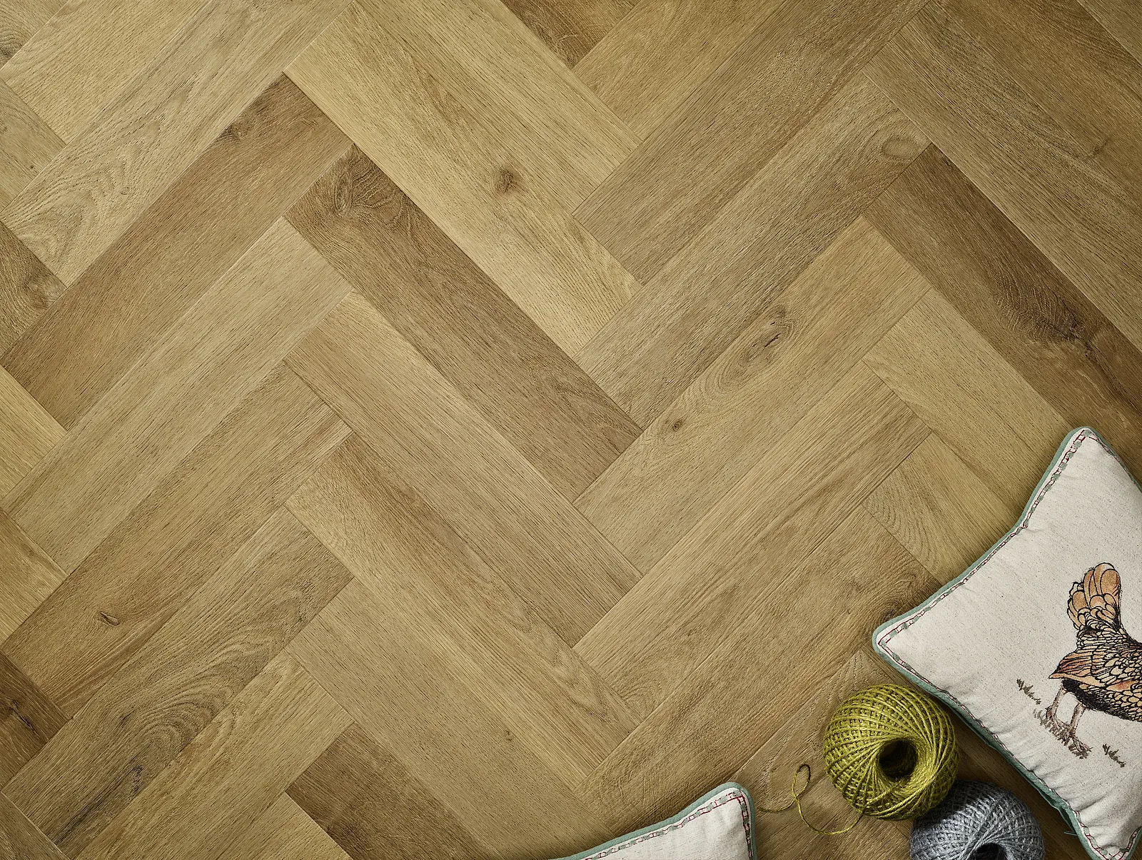 Natural Oak herringbone LVT flooring